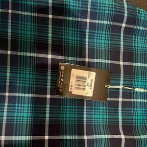 Teal plaid golf skort